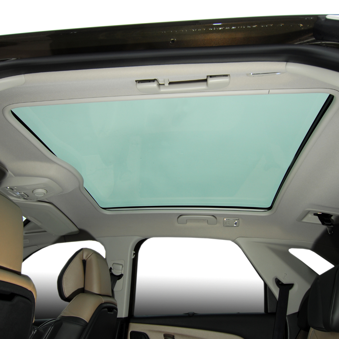 Panoramic sunroof interior of a modern car.